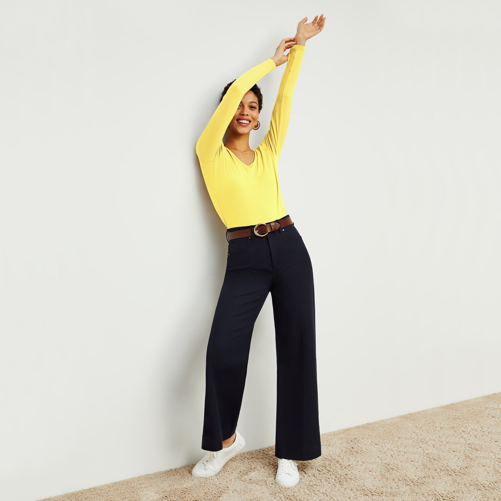 Front image of a woman standing wearing the Milo Jean in ink | Exclude