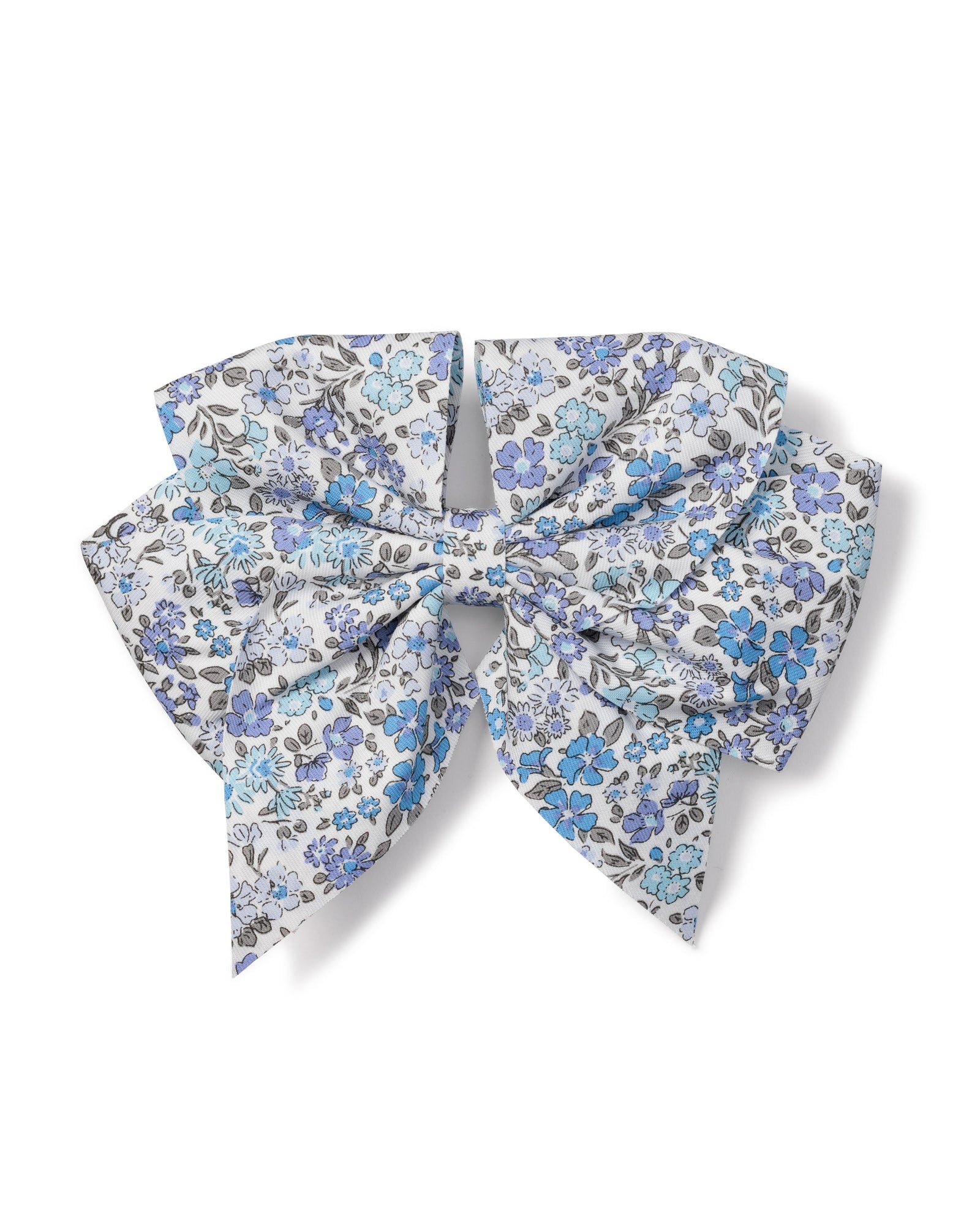 The Petite Plume Girls Twill Hair Bow in Fleur DAzur is a charming accessory with two loops and four hanging ends, symmetrically arranged, featuring a floral pattern in enchanting blue, light blue, and gray shades against a white backgroundâ€”ideal for girls hair.