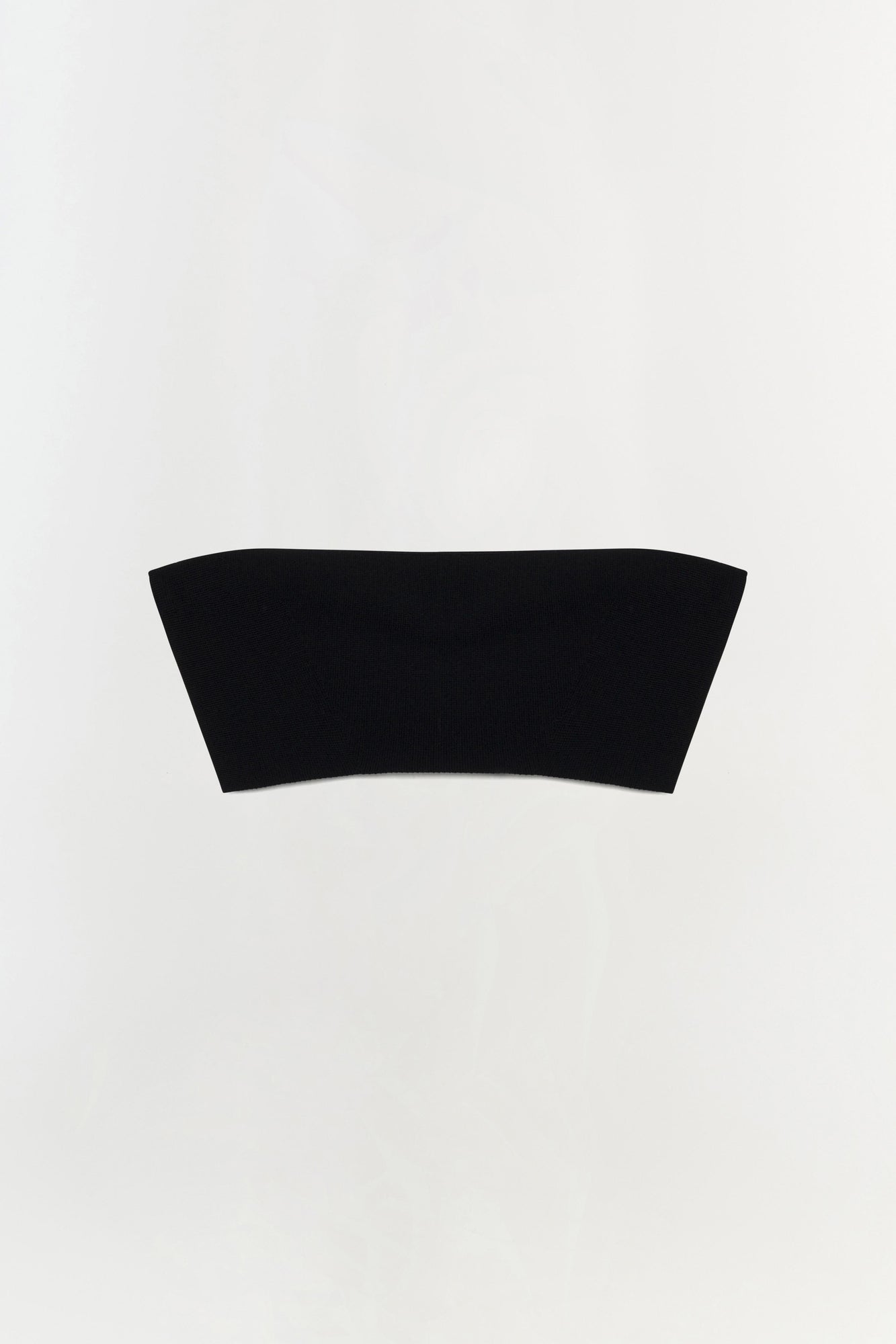 Black knit bralette with a curved bandeau neckline and ribbed texture displayed flat on a neutral background.