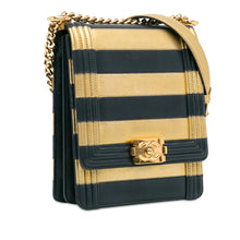 Chanel | Pre-Owned Metallic Lambskin Striped North South Boy Flap | Gold