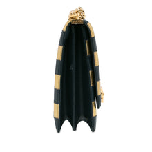 Chanel | Pre-Owned Metallic Lambskin Striped North South Boy Flap | Gold