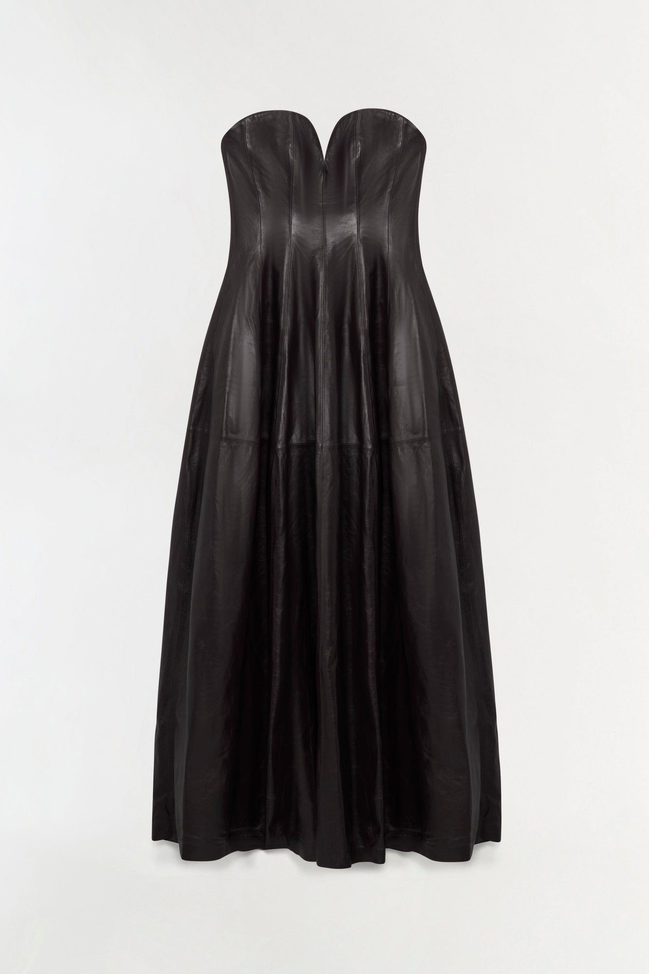 Black leather bustier gown with strapless sweetheart neckline and full pleated skirt.