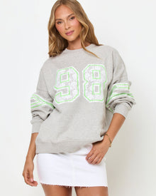 Front studio view of the Legend Sweatshirt in Limeade, a heather gray oversized crewneck sweatshirt with a neon green 