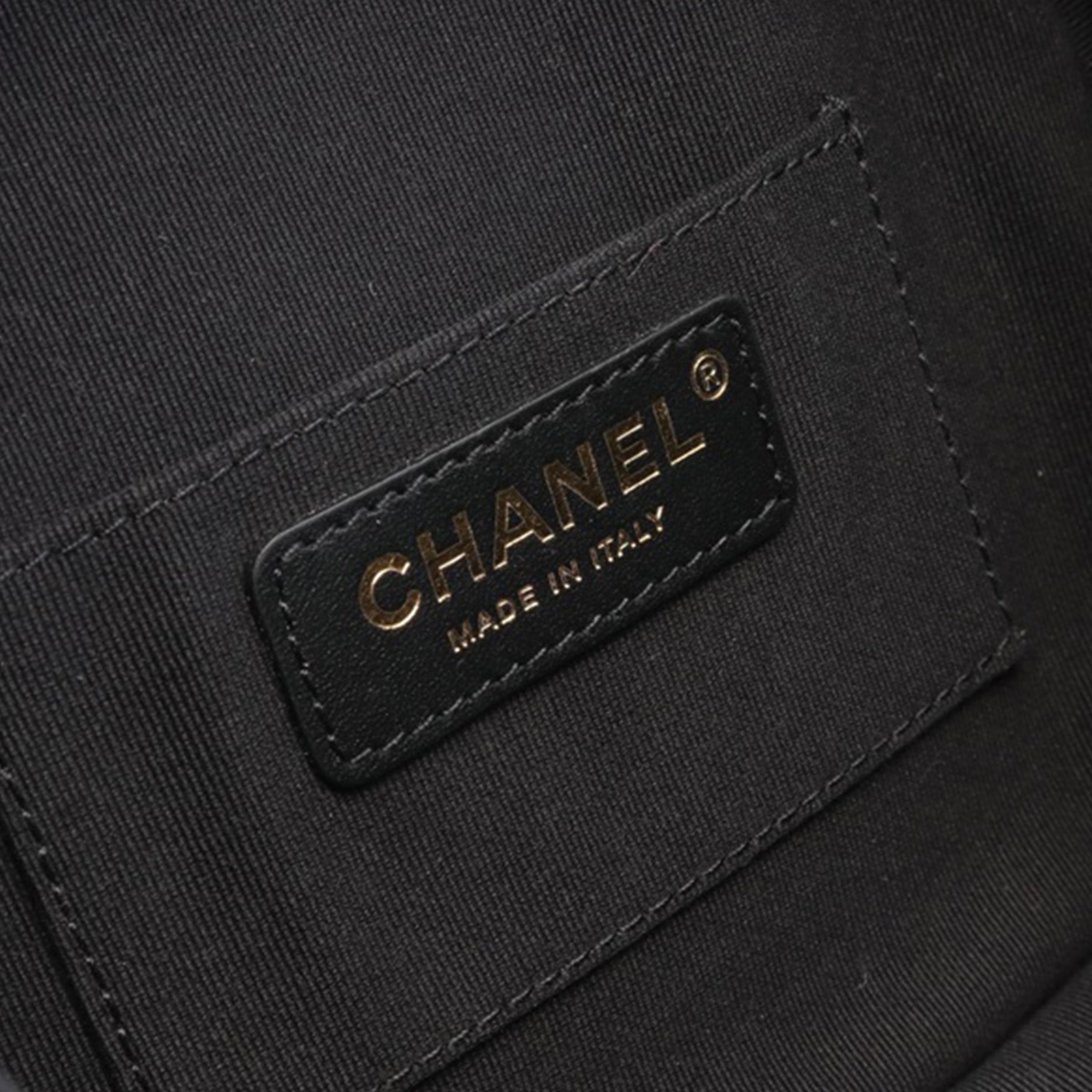 Chanel | Pre-Owned Quilted Lambskin Oval Logo Chain Top Handle Round Clutch on Chain | Black