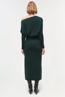 Dark green off-shoulder midi dress with long sleeves and fitted silhouette, shown from back view.
