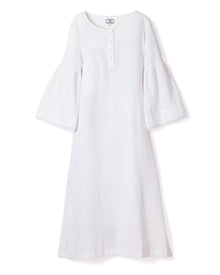 The Womens Flannel Seraphine Nightgown in White by Petite Plume is a long-sleeved, buttoned-neckline dress with bell sleeves. Made from high-quality cotton, it combines simplicity and elegance with a loose fit and modest length.