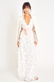 White lace long sleeve gown.