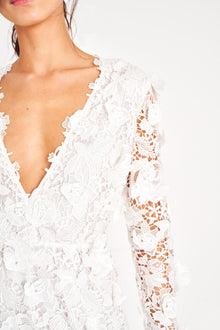 White lace long sleeve gown.