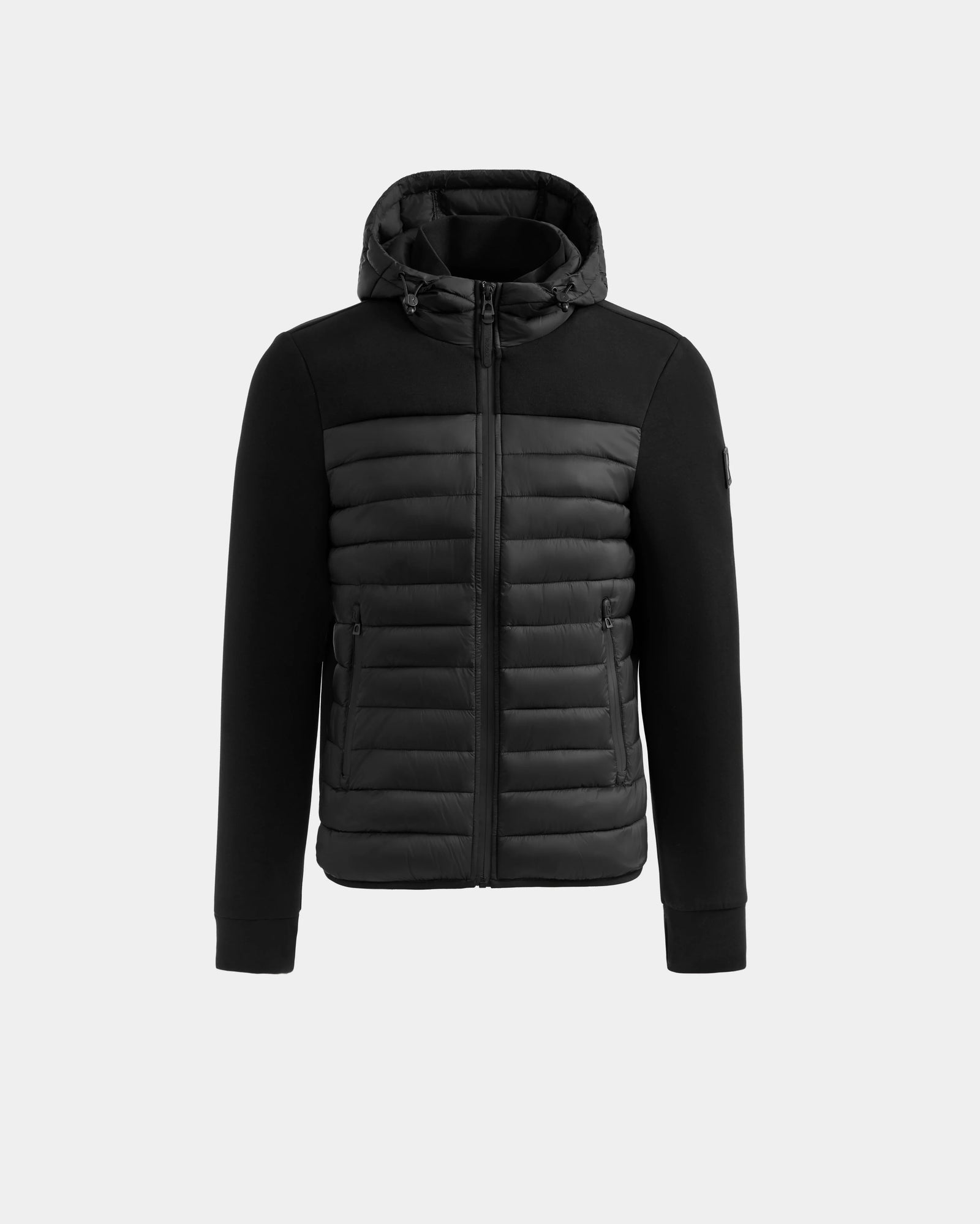 The DURIN M - M125530 Black men’s hooded jacket by Rudsak features a quilted, padded front with lightweight down insulation, zip closure, and smooth fabric sleeves and sides, shown on a plain light gray background.