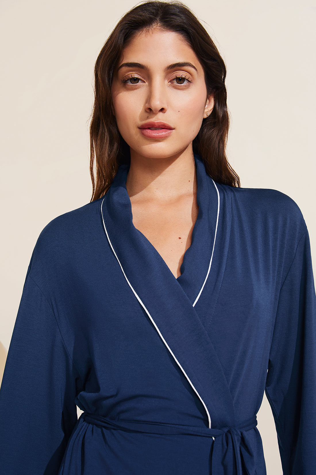 Model is wearing the Gisele TENCEL Modal Robe in navy/ivory.