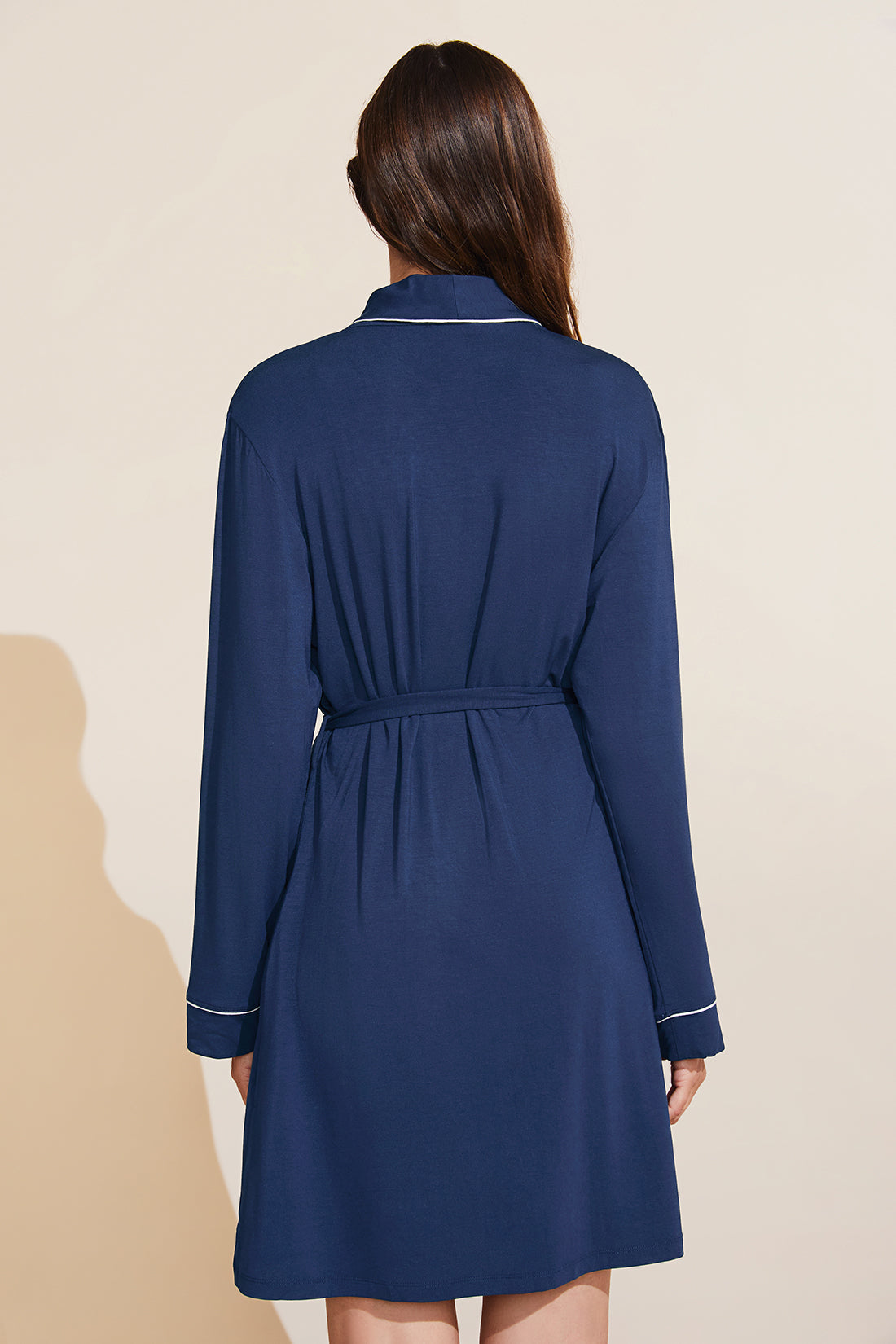 Model is wearing the Gisele TENCEL Modal Robe in navy/ivory.