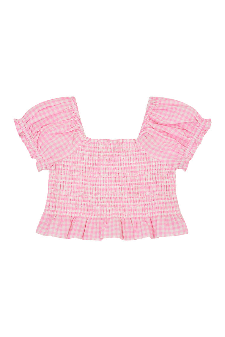 Pink gingham cotton off the shoulder top with puff sleeves and a smocked bodice flowing to a peplum finish for girls.