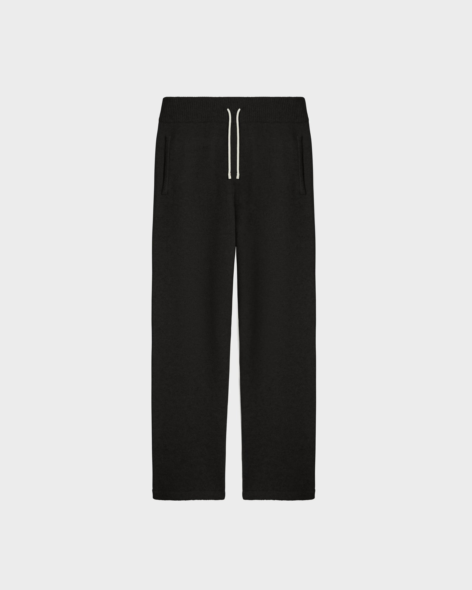 The Rudsak GEIGER - 9524512 Black M is a relaxed fit lounge pant with a white zipper.