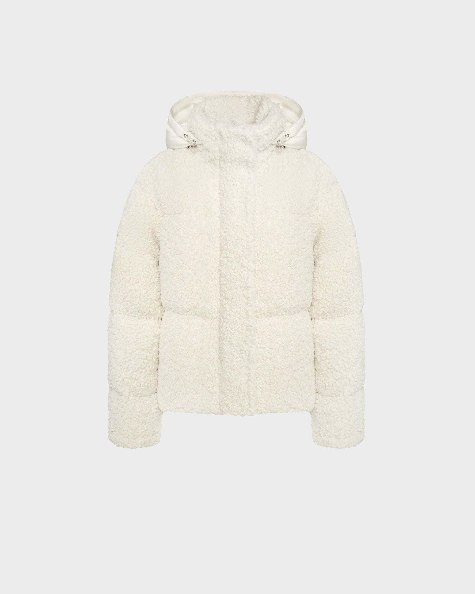 The Rudsak IKSA - 8124706 Iceland is a women’s white hooded teddy down puffer jacket with fleece texture, front zipper, and snap closure, shown against a plain light gray background.