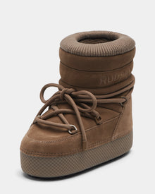 The Rudsak MACE S - 8224543 Camel is a single brown, high-top winter boot with thick padded ankle, large front laces, a textured platform sole, water-repellent suede finish, and RUDSAK branding on the side.