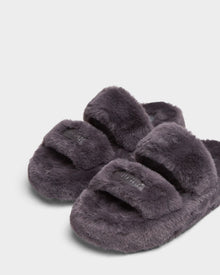 The Rudsak ZETA - 8224508 Grey are women’s faux fur slippers in dark gray, featuring two wide fuzzy straps across the top, shown on a plain white background.