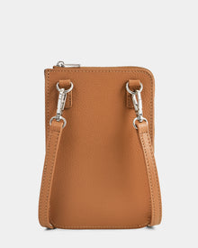 The CELYN - L325514 Taupe by Rudsak is a small, rectangular women’s crossbody bag in tan pebbled leather, shown from the back with silver-tone hardware and two detachable strap clips on metal rings against a plain white background.