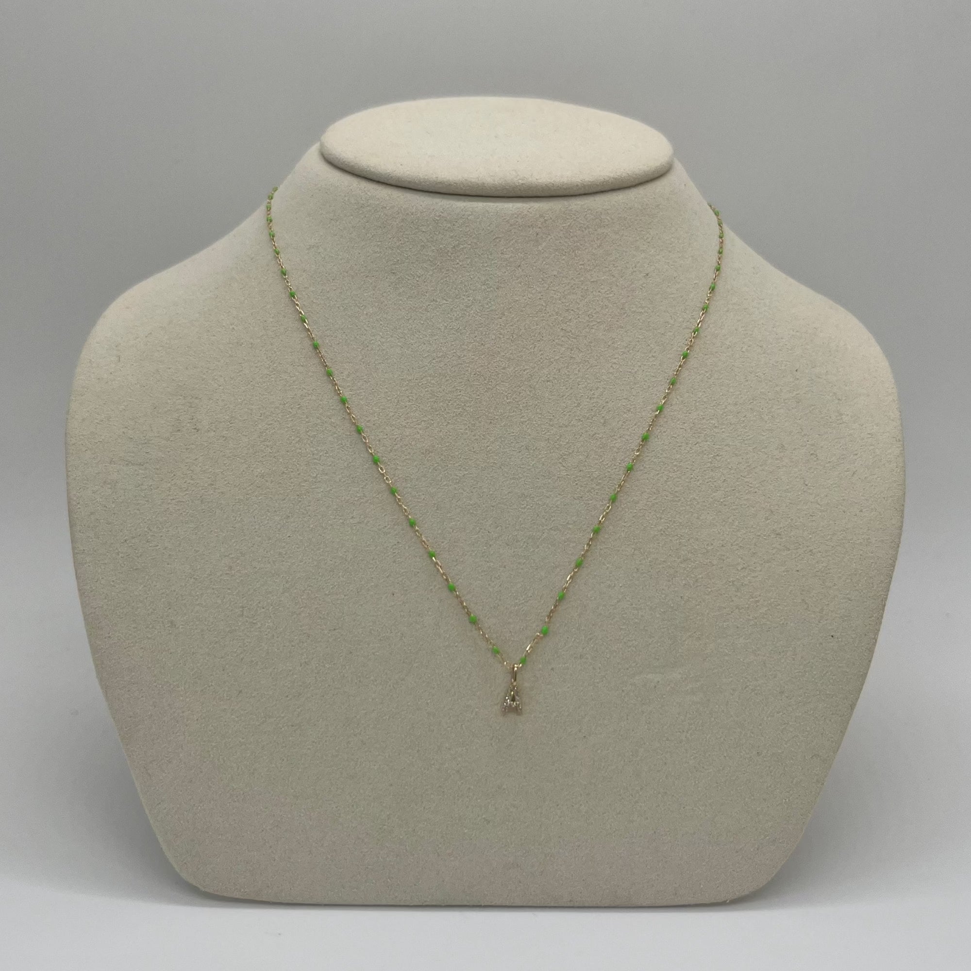 Still life image of Green Enamel Necklace with Pave Letter