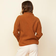 Back view of model wearing the leopard trim fleece jacket in caramel.