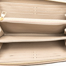 Louis Vuitton | Pre-Owned Monogram Giant Empreinte Zippy Wallet | Brown/Taupe