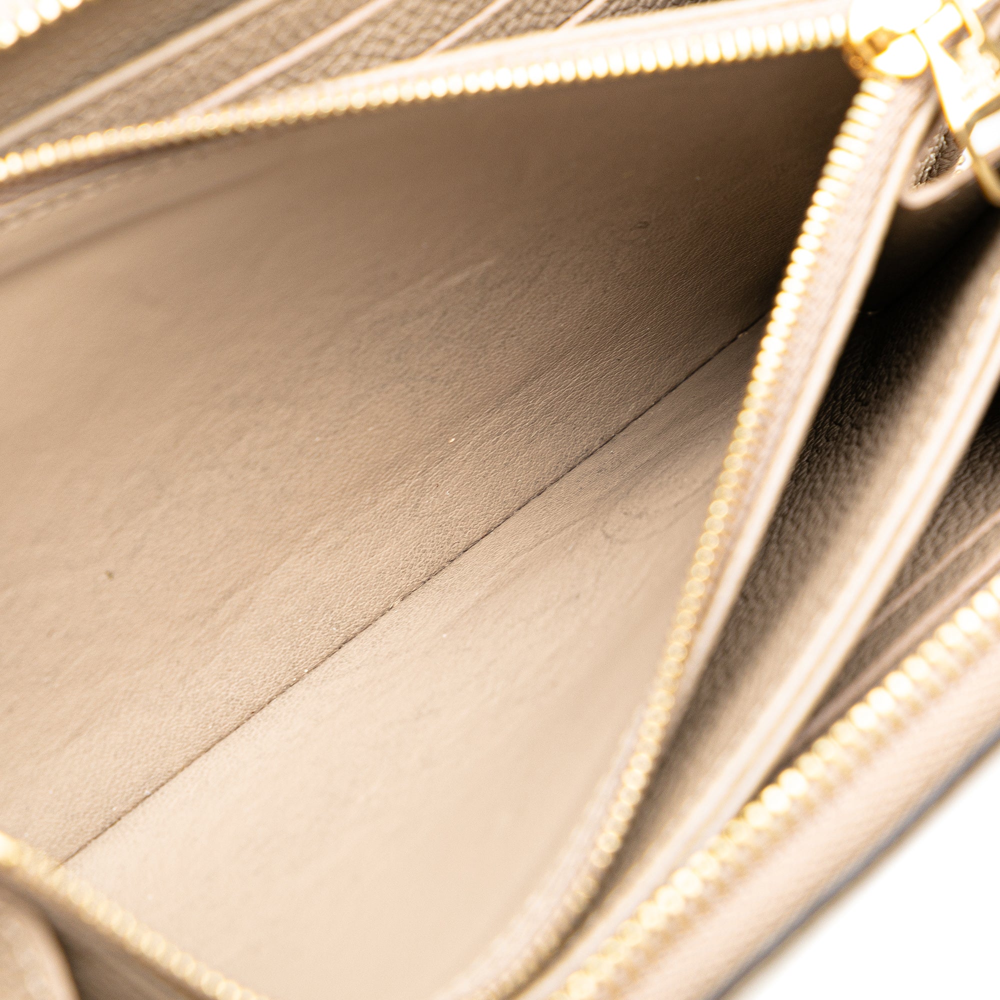 Louis Vuitton | Pre-Owned Monogram Giant Empreinte Zippy Wallet | Brown/Taupe