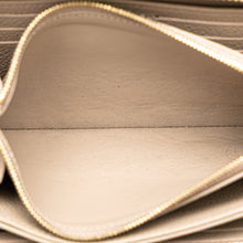 Louis Vuitton | Pre-Owned Monogram Giant Empreinte Zippy Wallet | Brown/Taupe