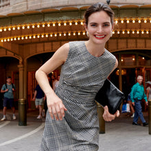 Front image of a woman wearing the jeannine dress in plaid sharkskin