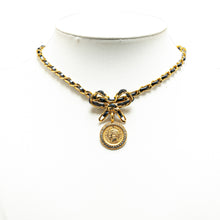 Chanel | Pre-Owned Leather and Gold Plated Medallion Bow Pendant Necklace | Gold