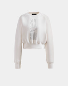 Add a ski-chic touch to your winter look with the Rudsak LIDDIE - L525505 Vanilla sweatshirt, a white cropped crewneck featuring long sleeves and 