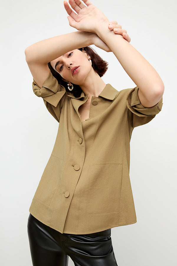 front image of a woman wearing the avelyn jacket in macaroon | Exclude | Grid Hover