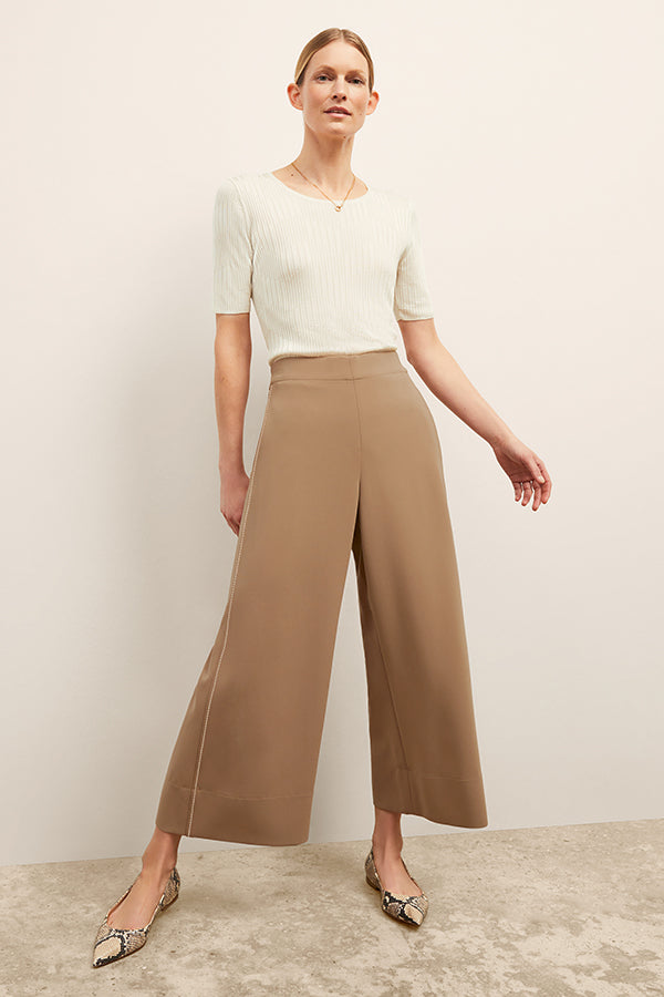 front image of a woman wearing the charlie top in ivory | Exclude