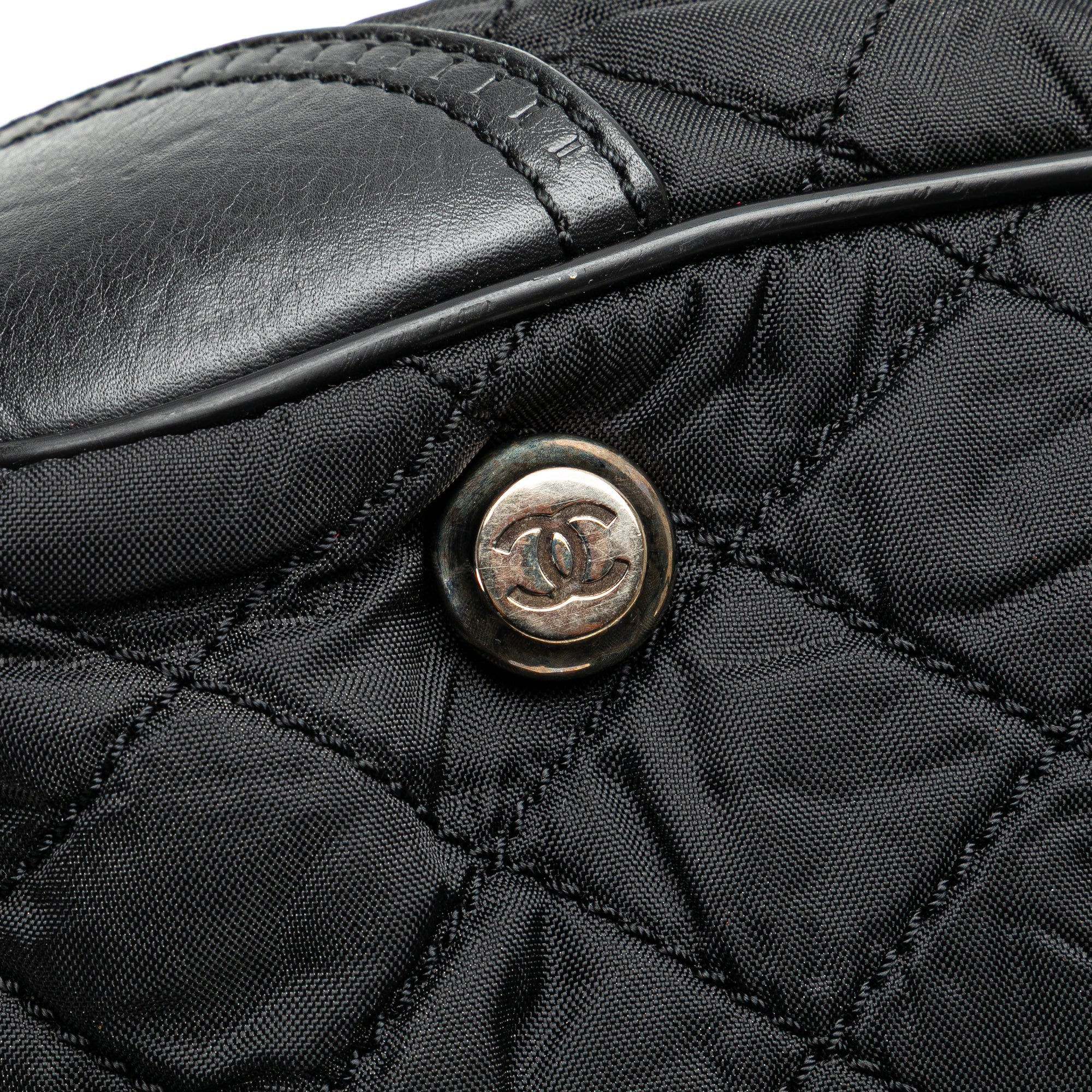 Chanel | Pre-Owned Paris New York Quilted Nylon Duffle Handbag | Black