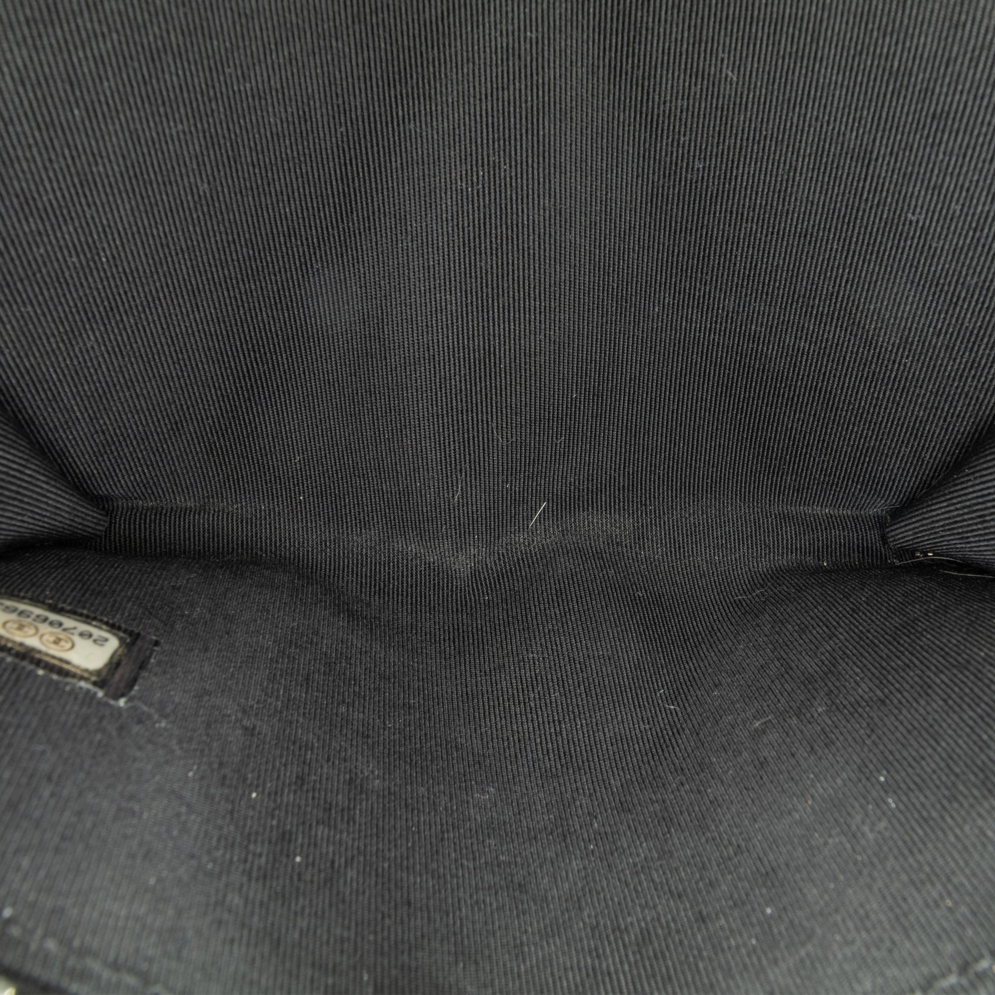 Chanel | Pre-Owned Bull Leather Studded Zip Wallet | Black