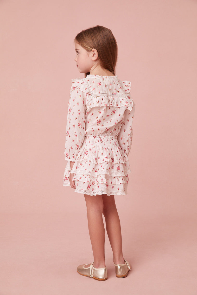 Floral print blouse featuring intricate custom lace detail at the round neckline and throughout the ruffle-adorned bib, airy long sleeves and small embroidery detail all over.