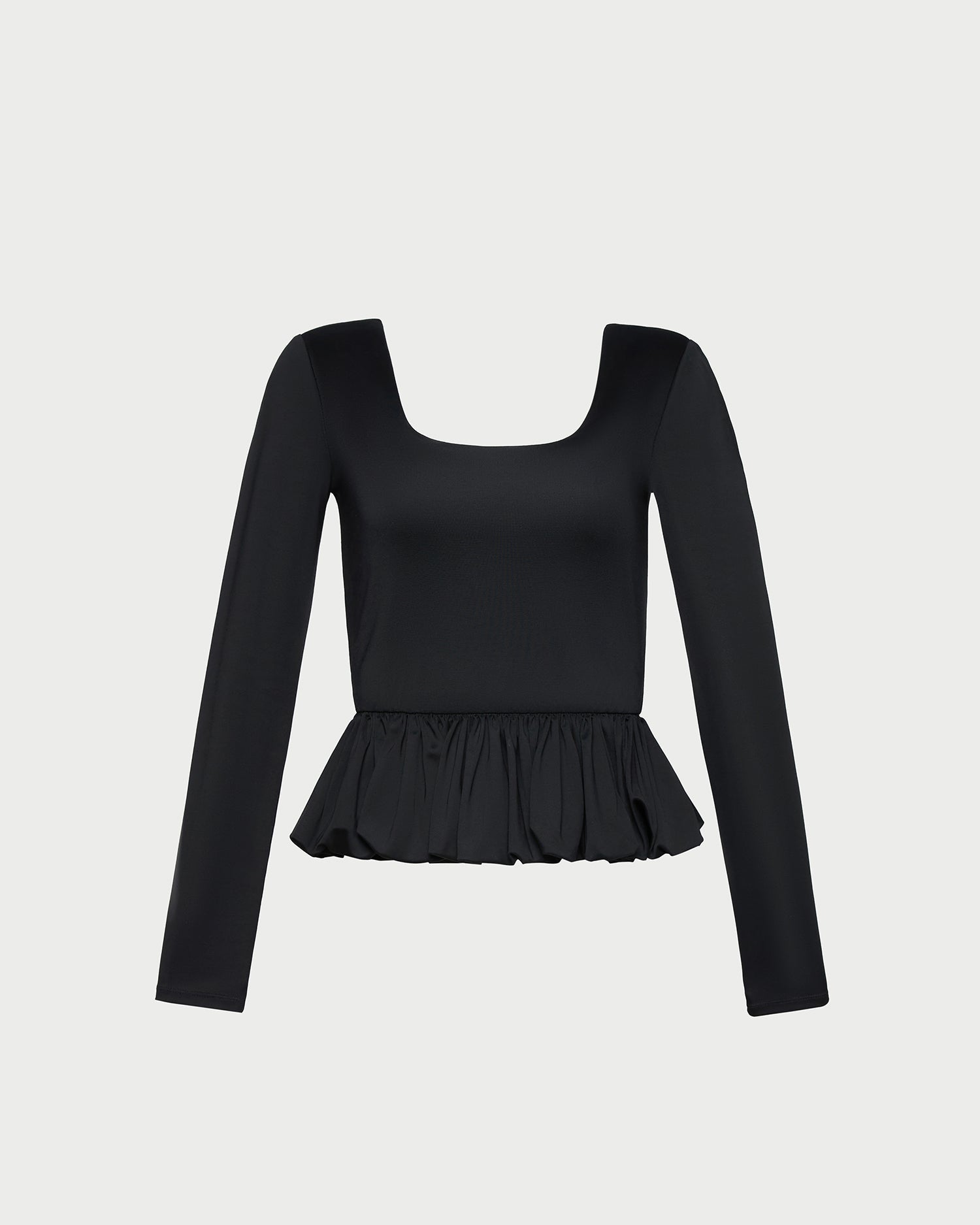 Posie Peplum Top in black jersey material.