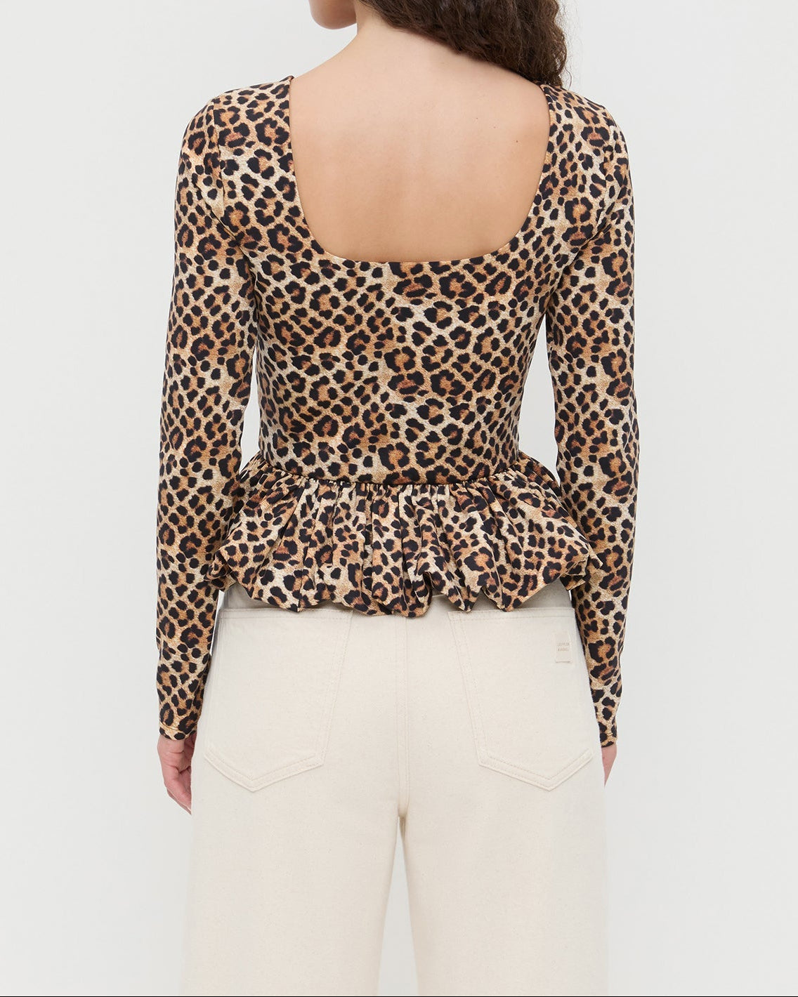 Posie Peplum Top in leopard print jersey material and Winona Denim Barrel Pants in natural.