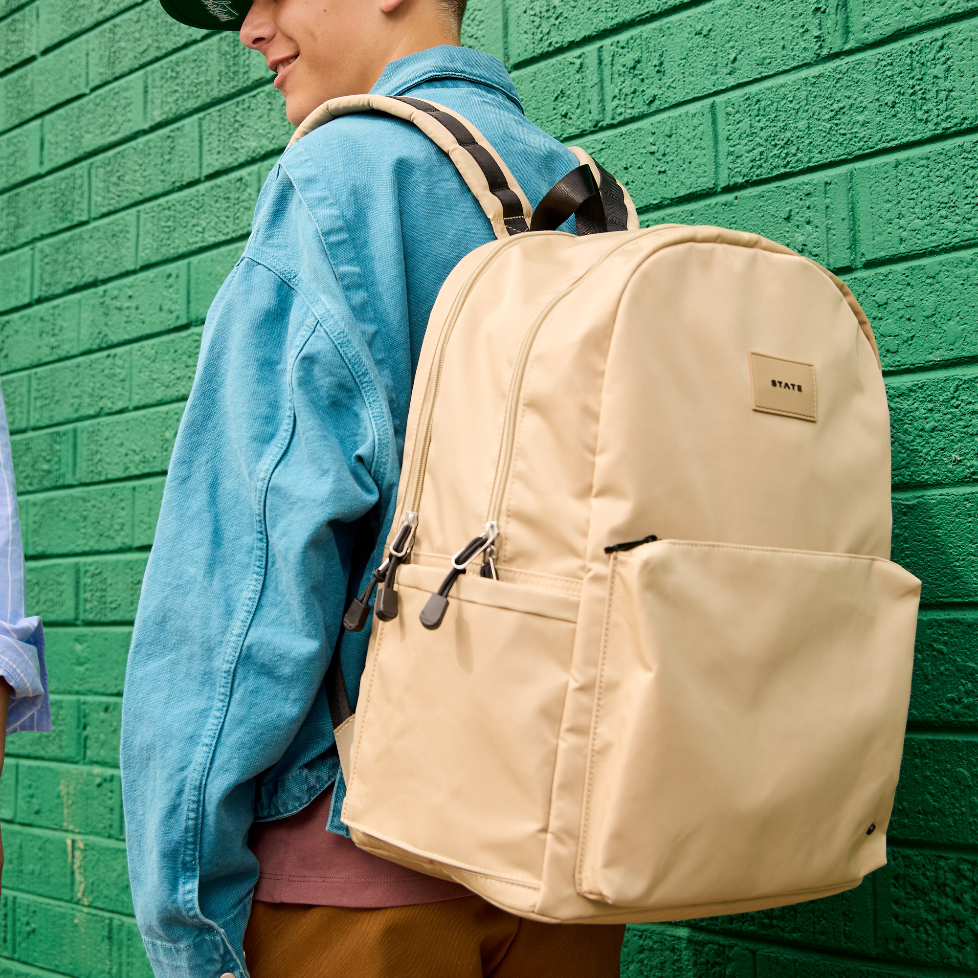 Boy wearing safari backpack