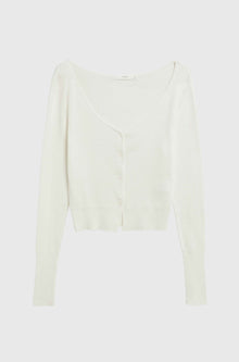 White long-sleeve top on a light gray background